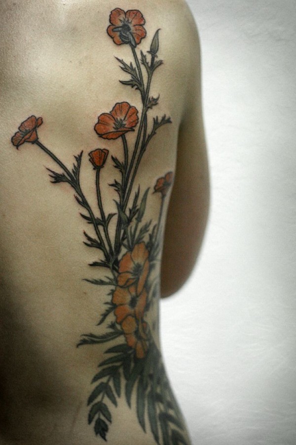 alice carrier tattoo red poppies on back