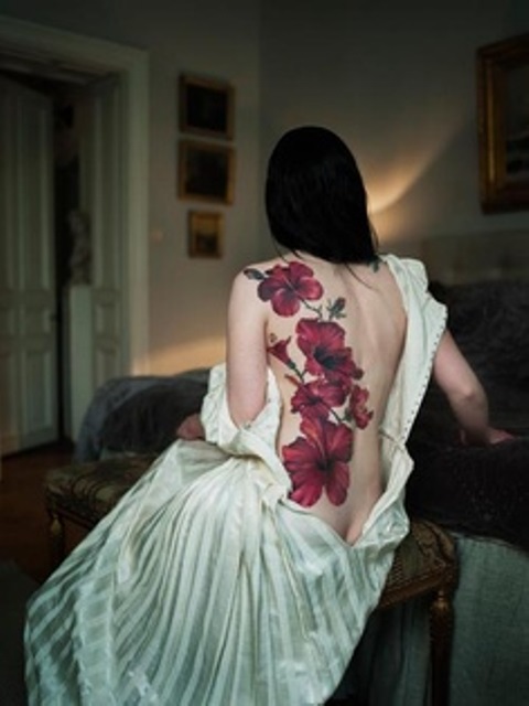 back tattoo design for women elegant red flowers