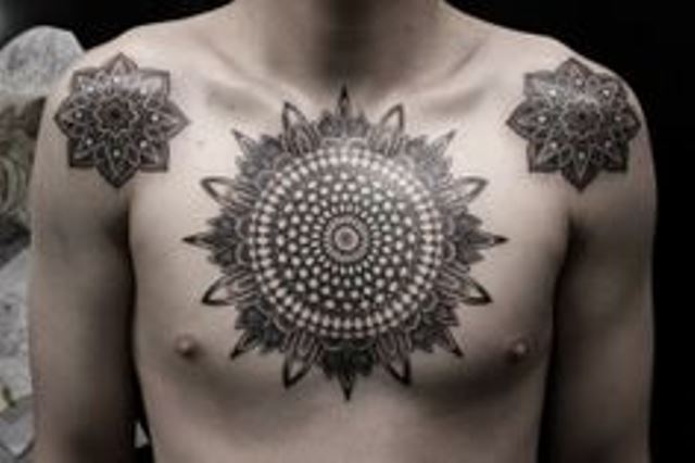 kenji alucky tattoo mandala on chest