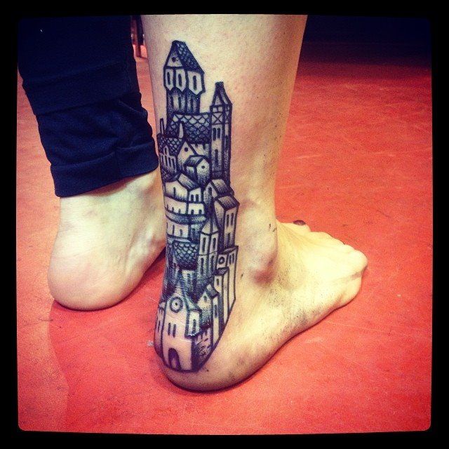 liam sparkes tattoo blue buildings on back leg