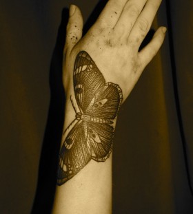 liam sparkes tattoo butterfly on arm and hand