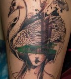 marta lipinski woman with swan  hat tattoo