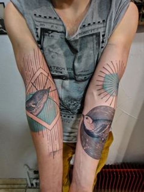 modern tattoo birds on arms