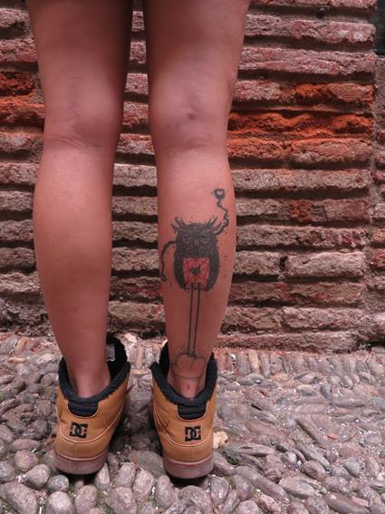 owl tattoo on back leg by matik