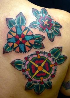 virginia elwood tattoo three mandala flowers on back shoulder