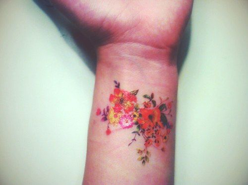 wrist tattoo floral work