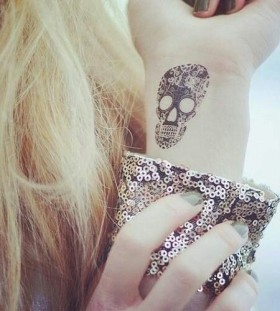 wrist tattoo skull