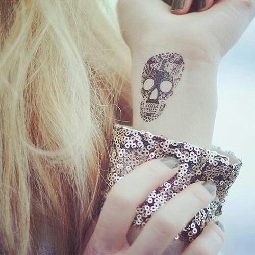 wrist tattoo skull