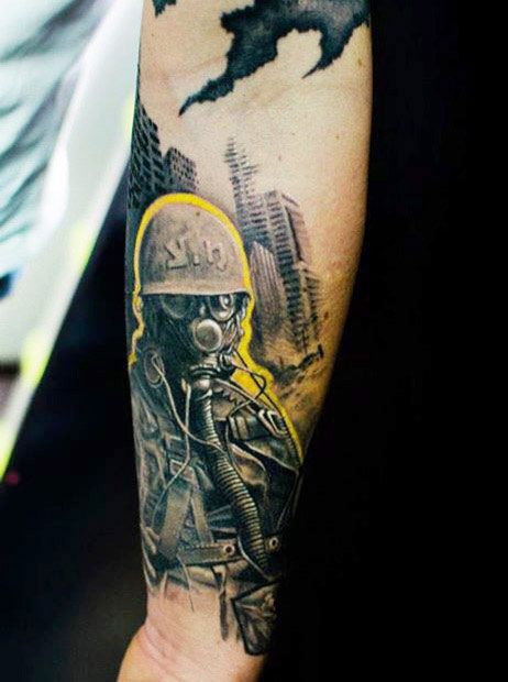 yellow contoured soldier with gas mask tattoo by klaim