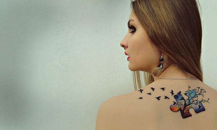 Amaizing woman puzzle tattoo