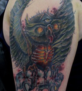 Angry owl tattoo by Mel Wink