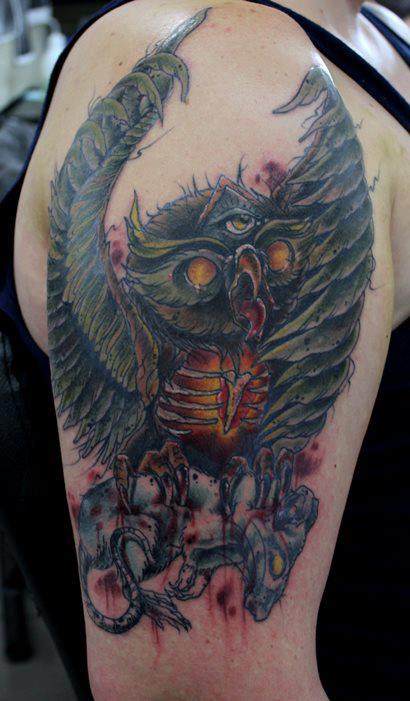 Angry owl tattoo by Mel Wink