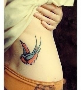 Awesome bird hip tattoo