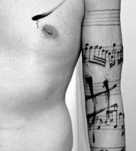 Awesome man  music tattoo