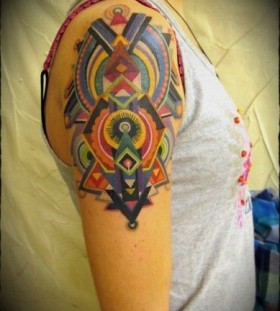 Awesome shoulder abstract character tattoos
