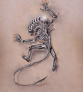 Black and white alien tattoo