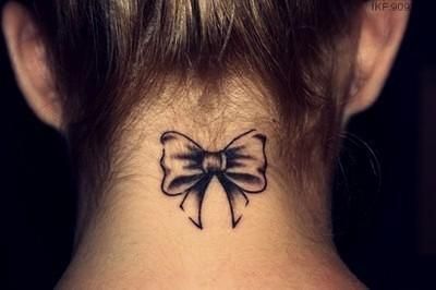 Bow small tattoo