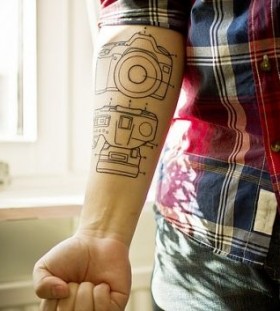 Camera details photorealistic tattoo