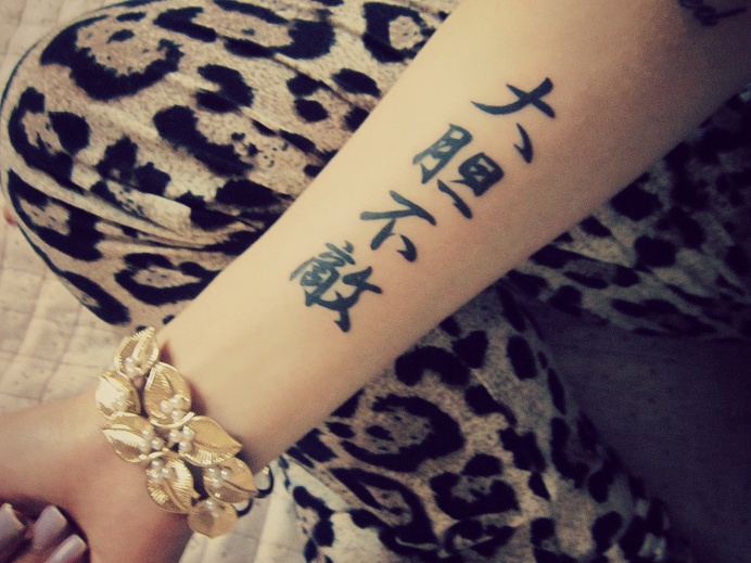 Chinese letters tattoo