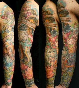 Colorful arms tattoo by Jee Sayalero