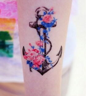 Colorful flowers and anchor tattoo