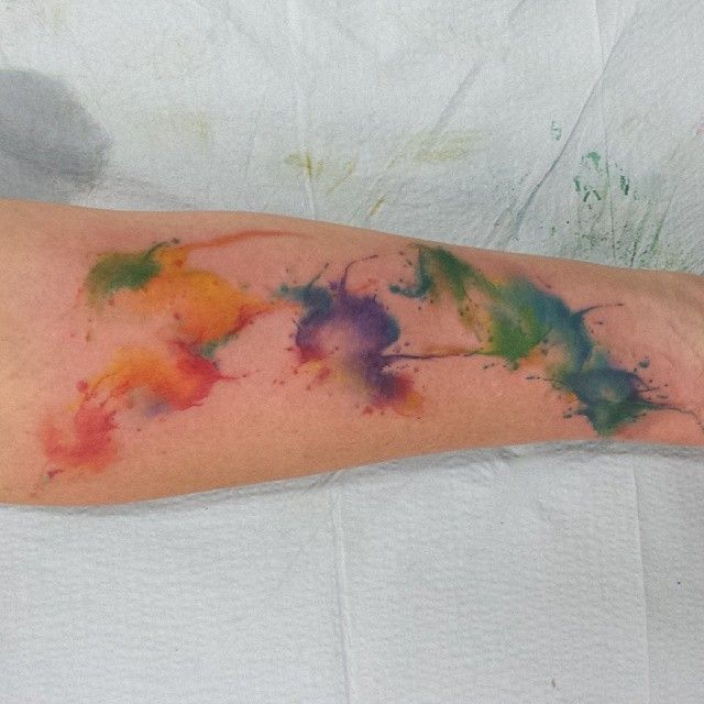 Colorful tattoo by Mel Wink