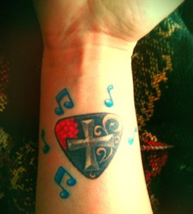 Criss  music tattoo