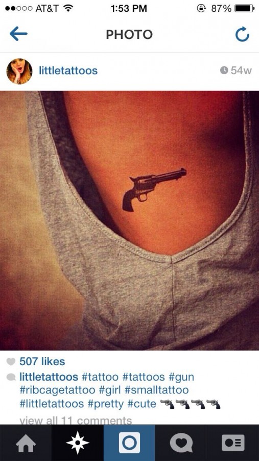 Cute guns tattoo