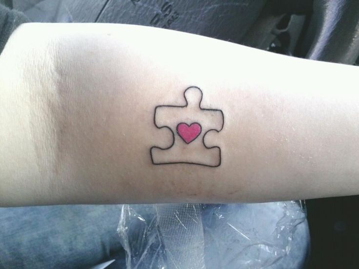 Cute puzzle tattoo