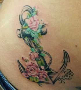 Flowers and anchor tattoo