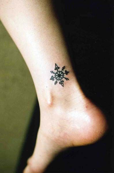 Foot black symbols tattoo