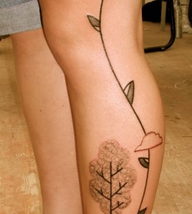 Leg abstract character tattoos