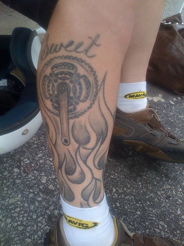 Leg biker tattoo