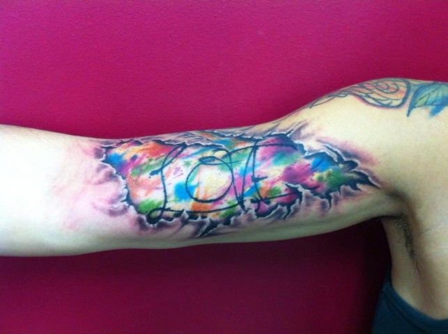 Love arm tattoo by Mel Wink