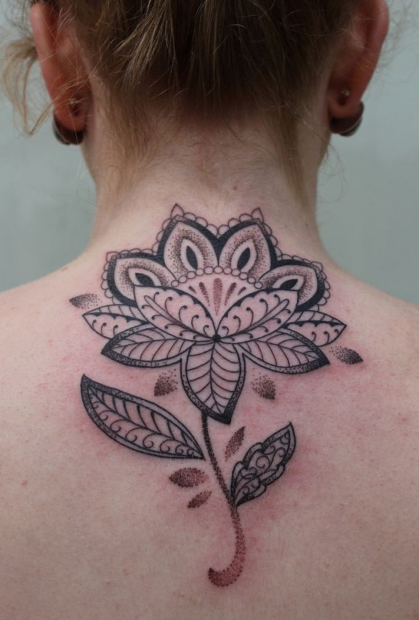 Lovely flower tattoo by Gemma Pariente