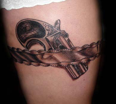 Lovely guns tattoo