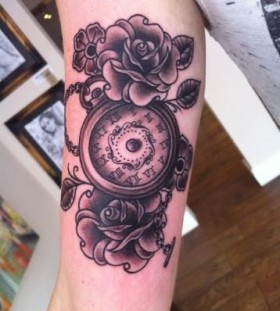 Lovely roses and clock tattoo