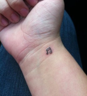 Lovely small  music tattoo