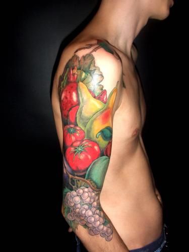 Man shoulder with food tattoo