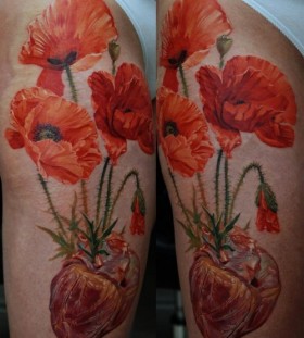 Poppy flowers photorealistic tattoo