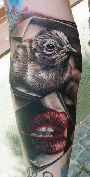 Red lips and bird tattoo by Zhivko Baychev