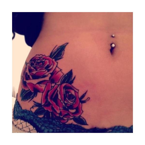 Red rosess hip tattoo