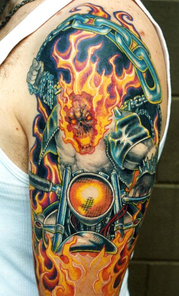 Shoulder biker tattoo