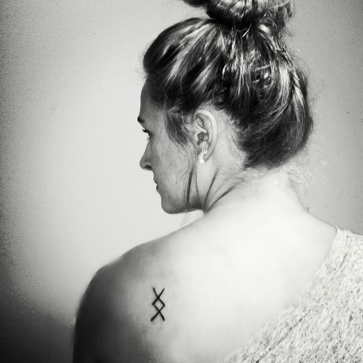 Shoulder symbols tattoo