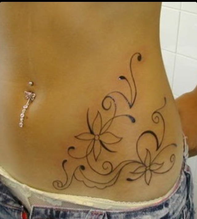 Simple flowers hip tattoo