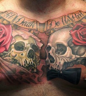 Skulls and red roses chest tattoo