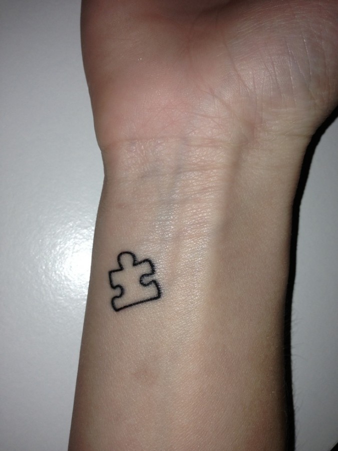 Small puzzle tattoo