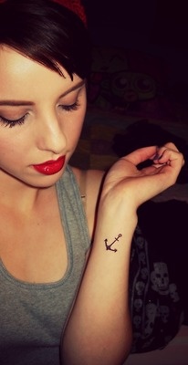 Woman pretty anchor tattoo