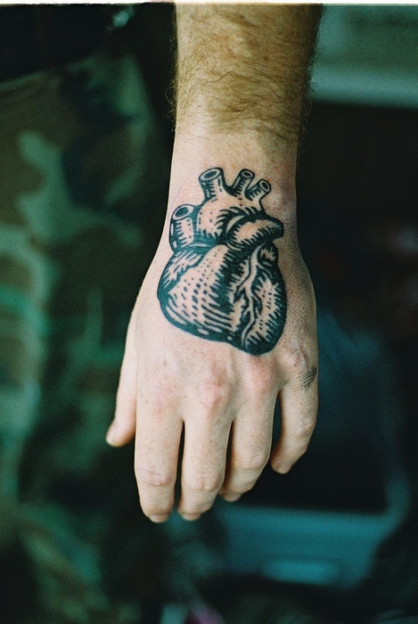 black heart tattoo for man