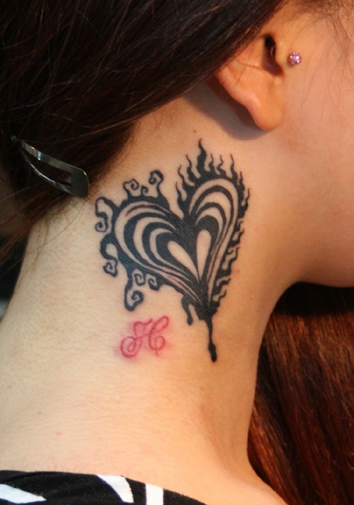 black heart tattoo on the neck